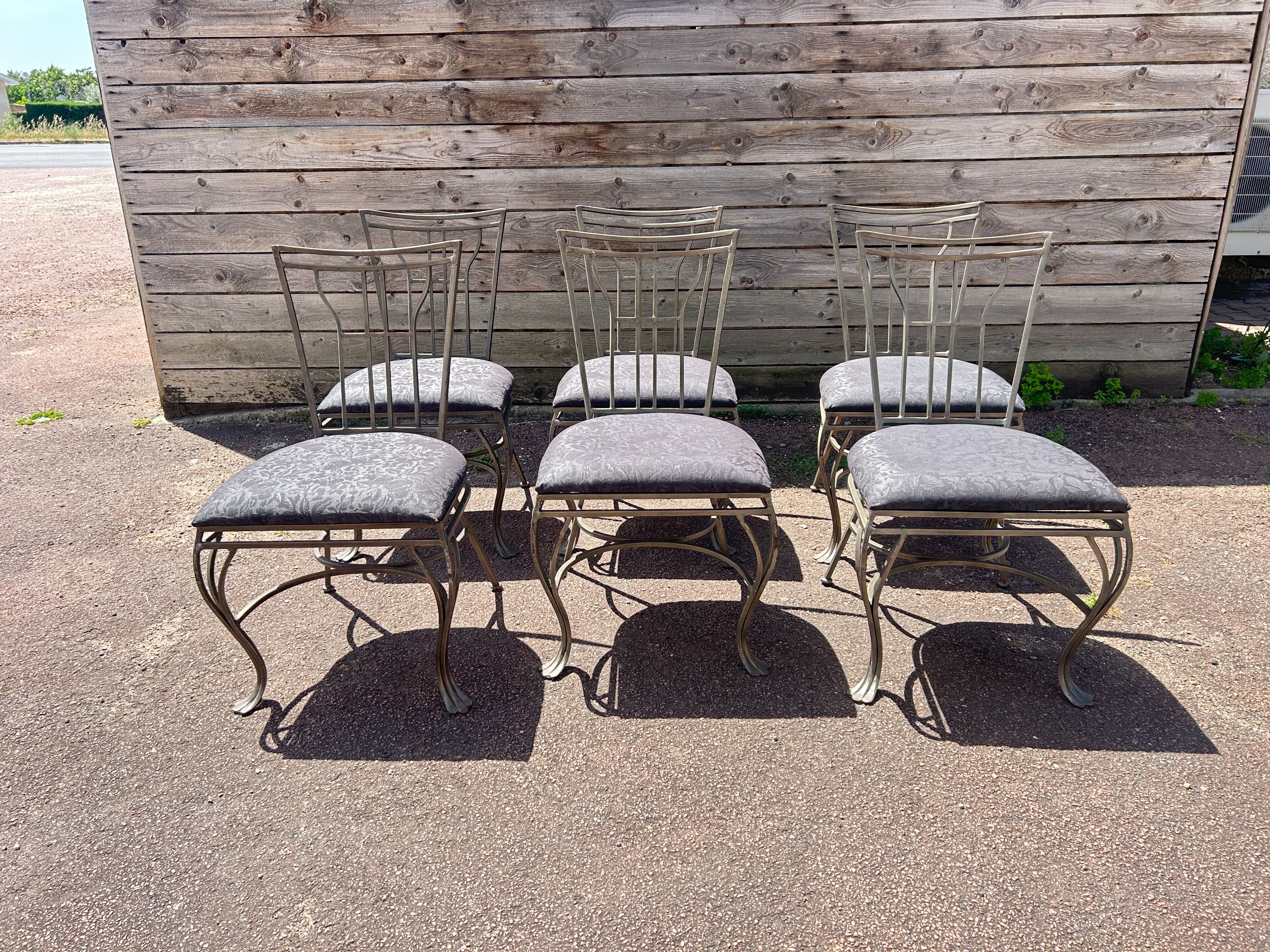 6 wrought iron chairs with fabric seats