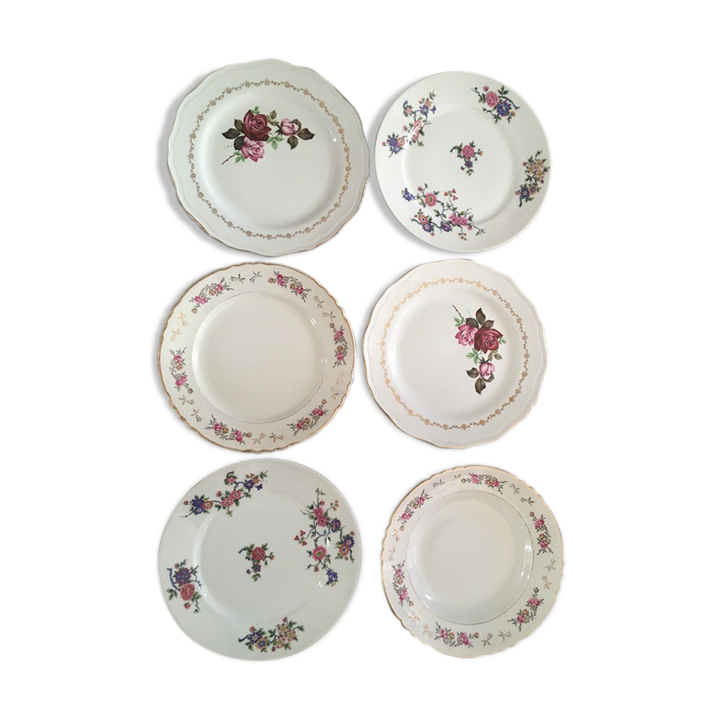 Six flat plates with flowers