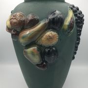 Green ceramic vase with polychrome decoration of fruits and vegetables in relief 33.5 cm