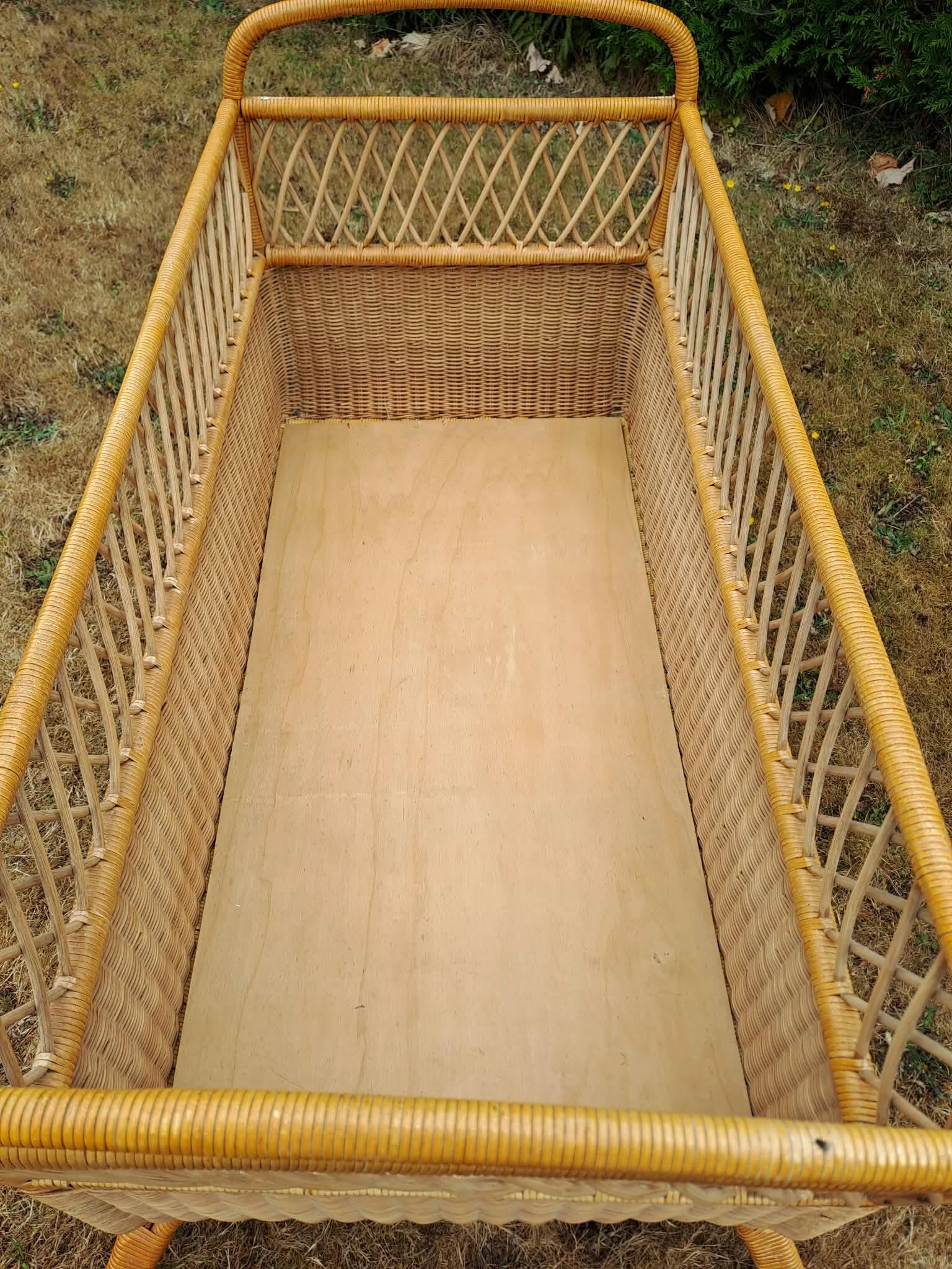 Rattan cradle.