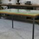 Saint-Gobain glass and black lacquered metal designer table, 1960s