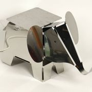 80s heavy metal chrome elephant floor lamp as side table Postmodern design