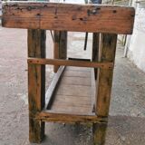 Workbench in raw wood with the press
