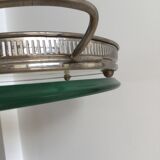 Vintage earthenware tray surrounded by antique metal