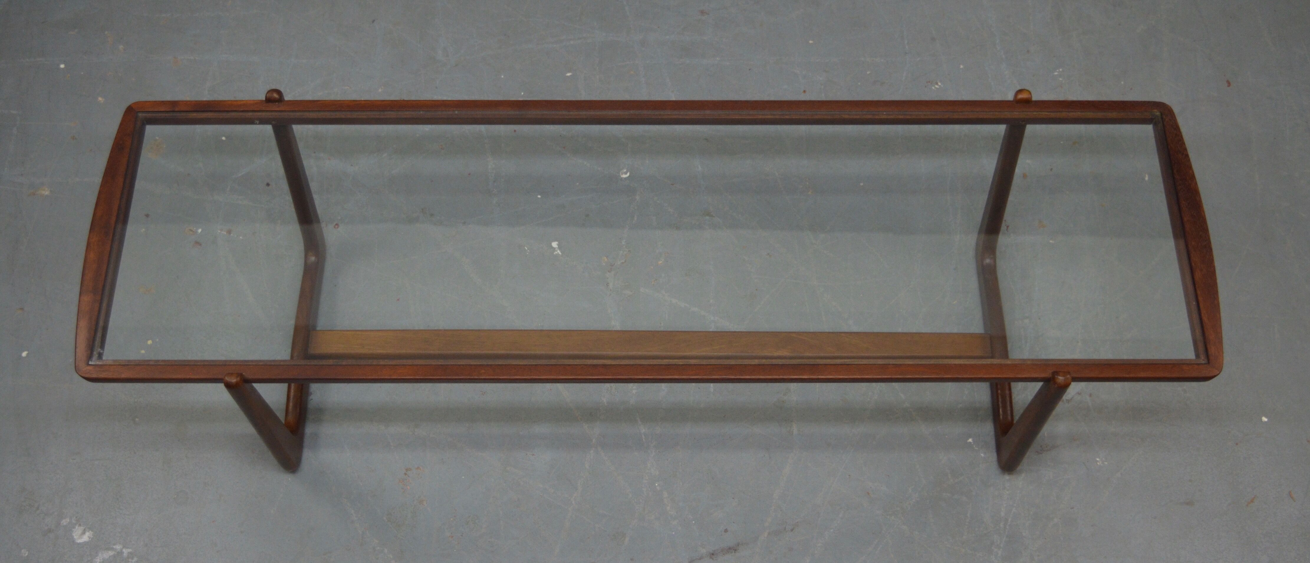 Mid century glass topped coffee table