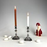 Pair of antique candlesticks in silver metal
