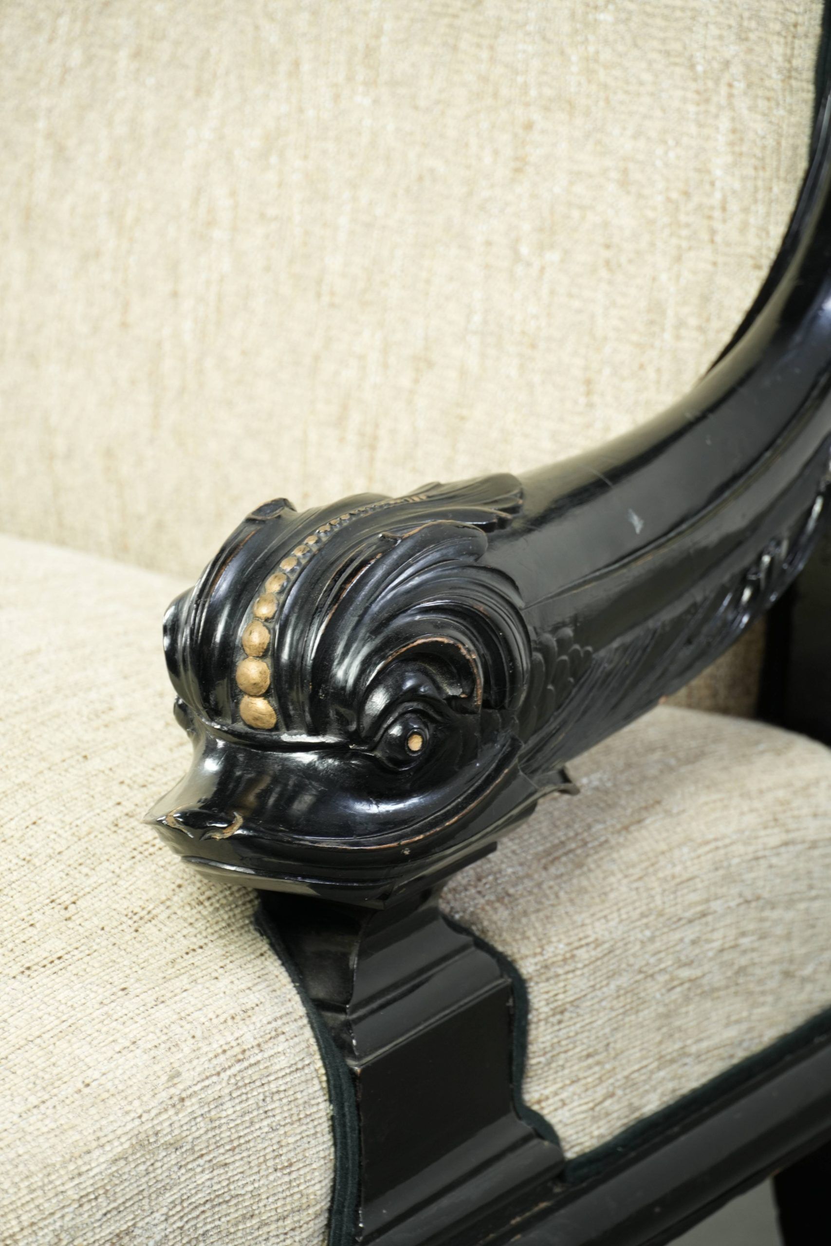 French sofa from the 19th century in Empire style with detailed armrests