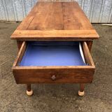 Antique solid cherry farmhouse table with 2 end drawers and 1 pull-out.