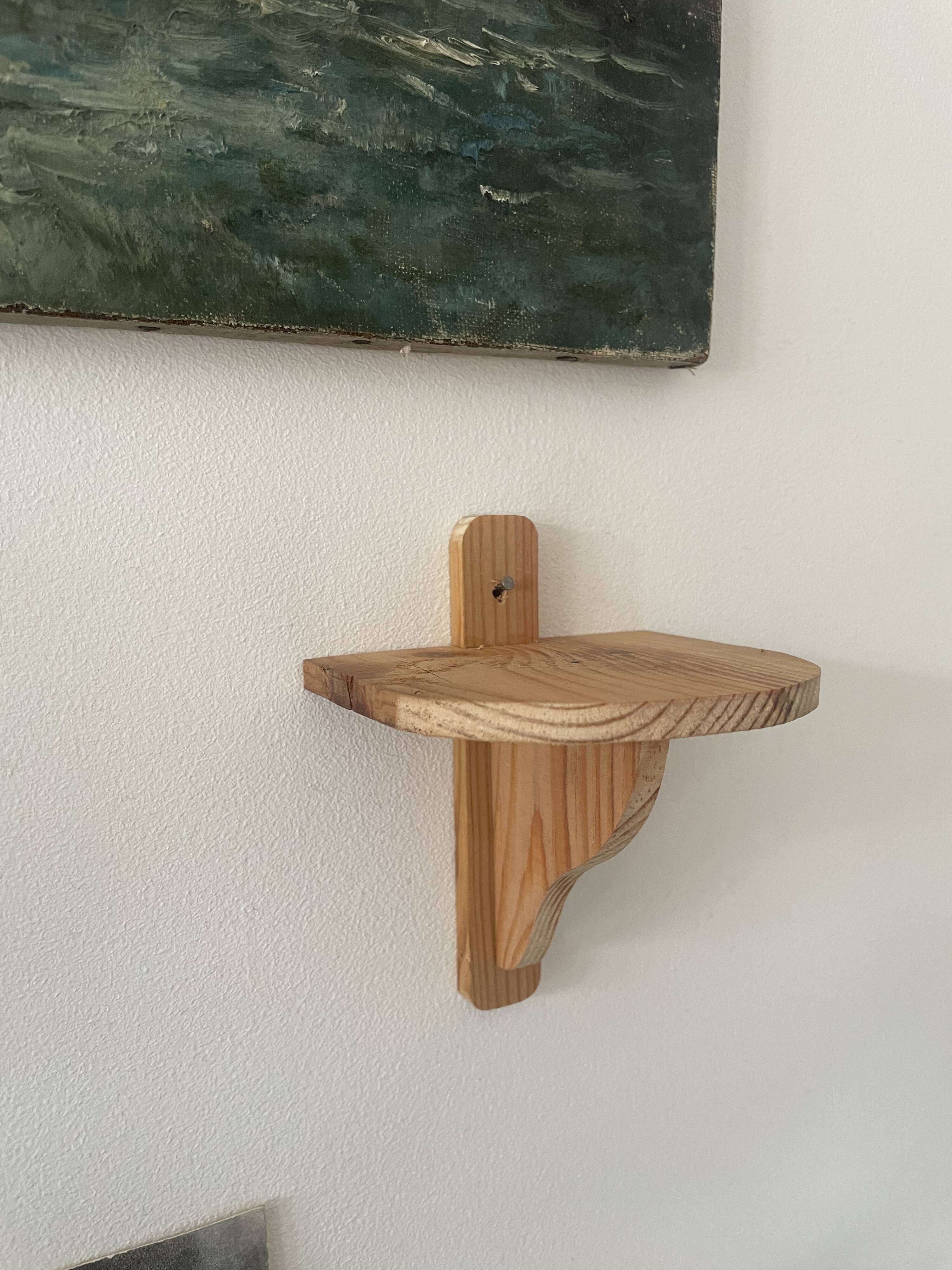 Small wooden wall shelf