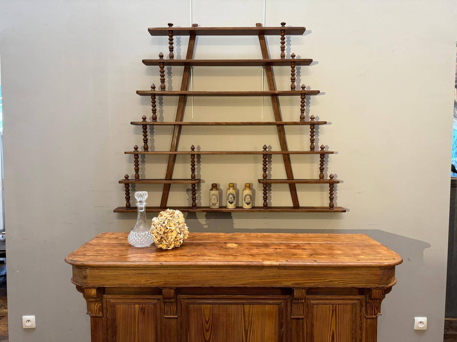 Turned wood bar wall shelf