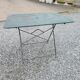 Old folding iron garden table