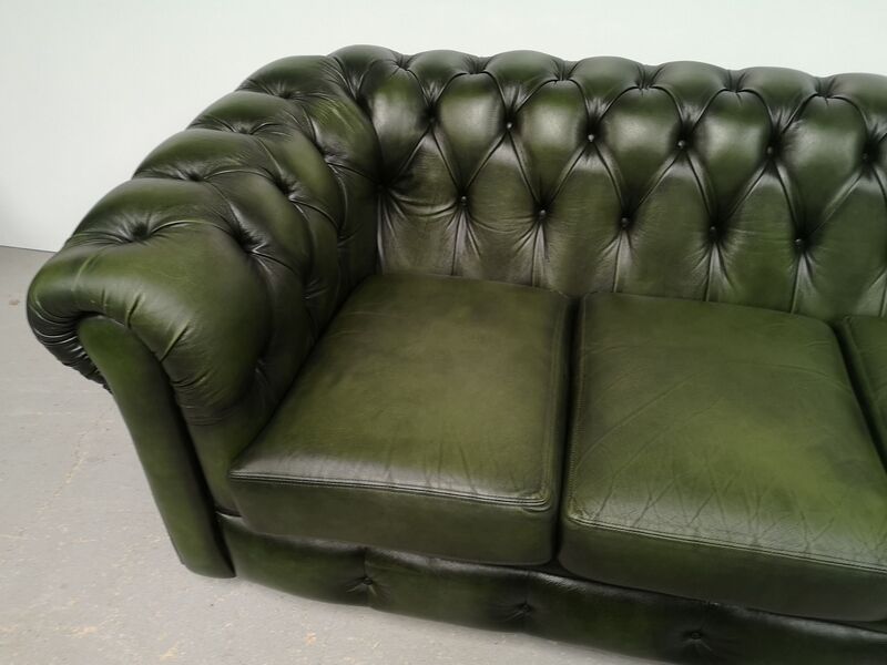 Three-seater green leather Chesterfield sofa