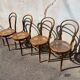 Set of 4 wooden and cane bistro chairs