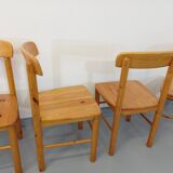 Suite of a round table with extension and 4 vintage pine chairs from the 60s and 70s