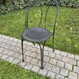 Black chair in vintage wrought iron 1980