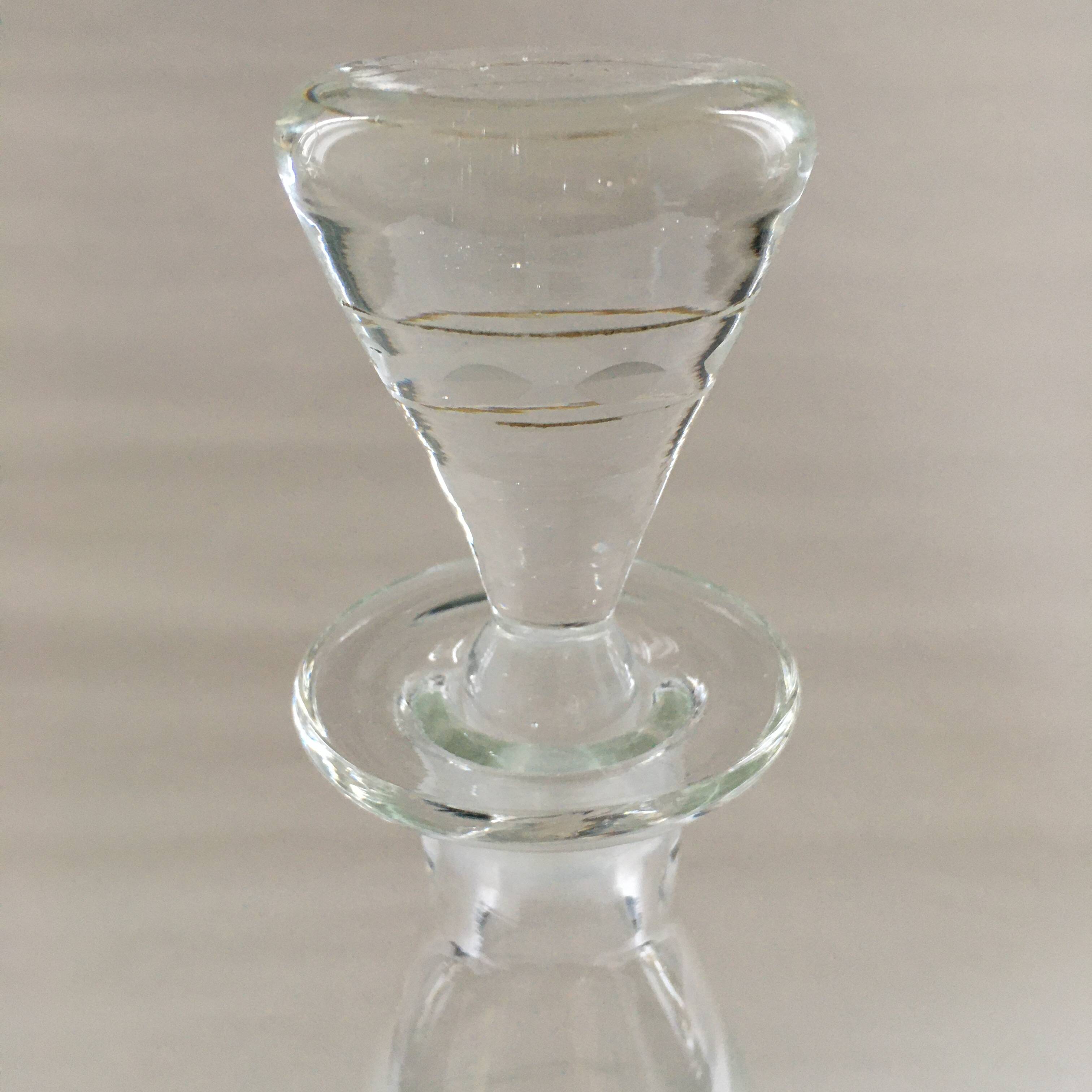 Carafe with chiseled floral decoration