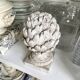 Ornamental artichokes in bleached concrete