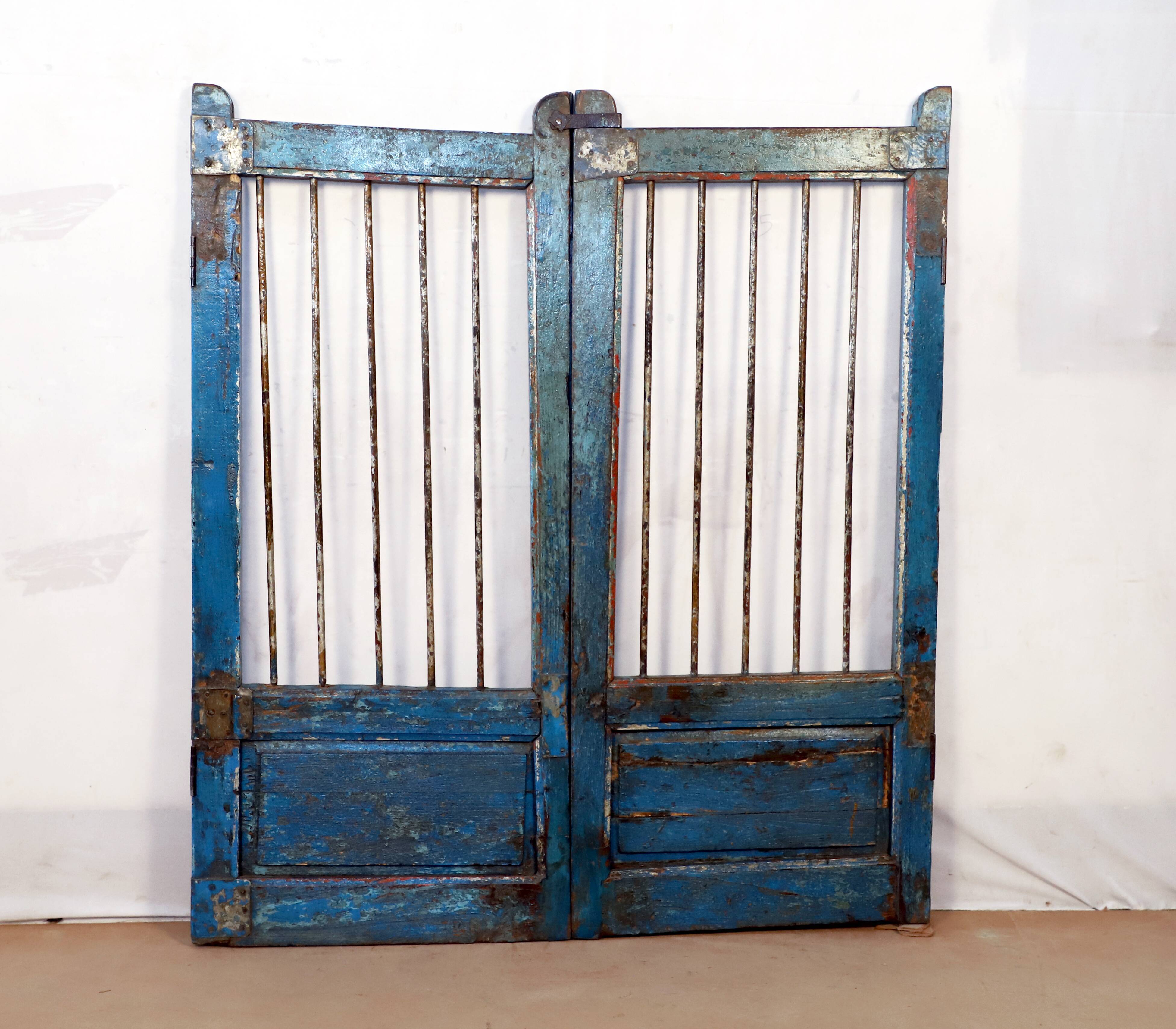Old burmese teak gate with openwork wrought iron panels