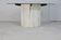 Living table, Comblanchian stone base and elliptical tray in smoked glass, Italy, 1970