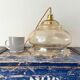 Vintage pendant lamp in electrified golden glass to nine