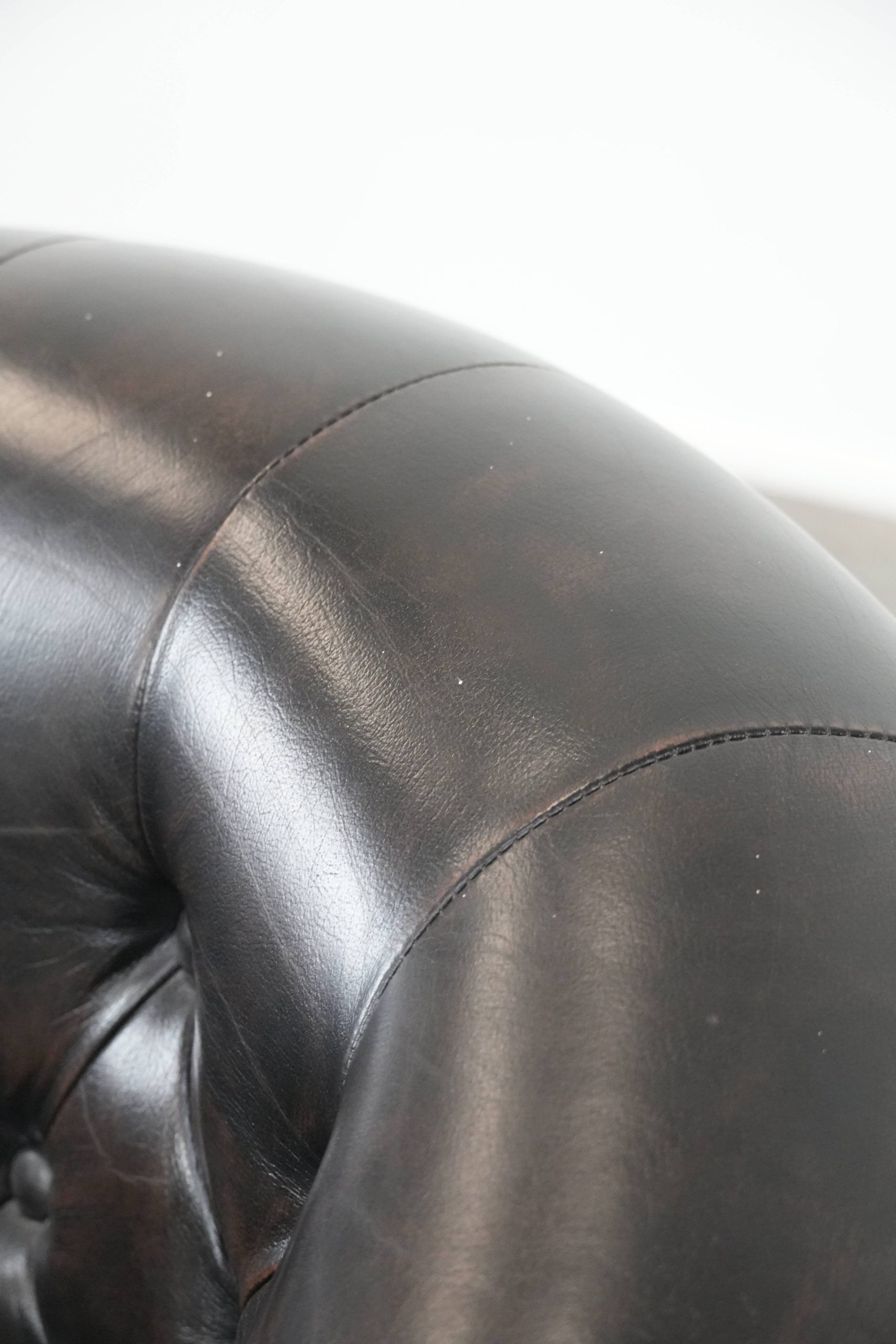 Dark luxury cowhide Chesterfield club armchair in English style
