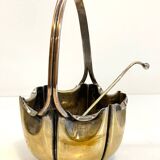 silver metal sugar bowl with gold patina