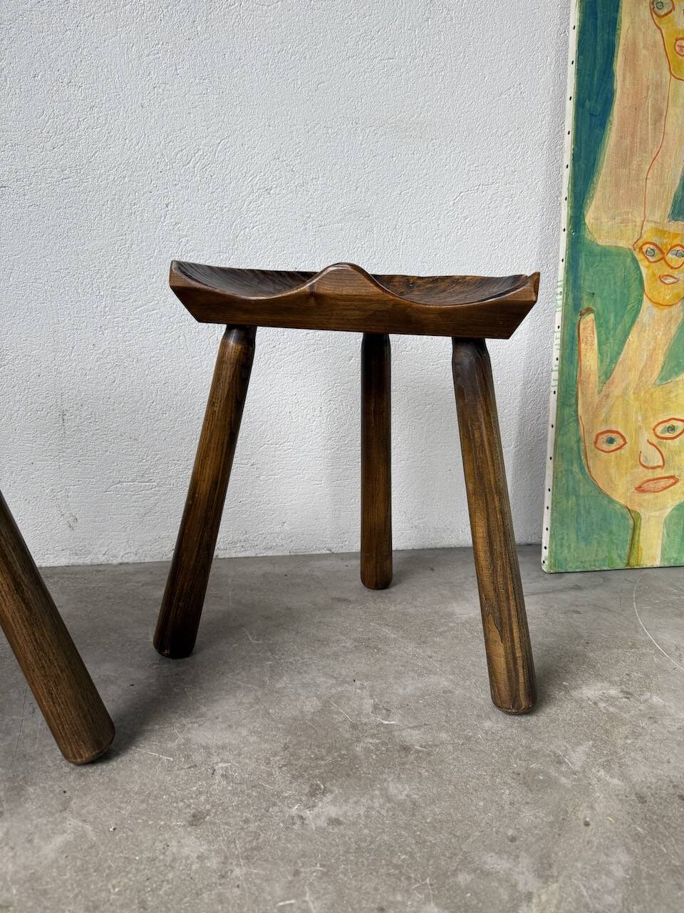 Pair of Le Selou tripod shepherd's stools