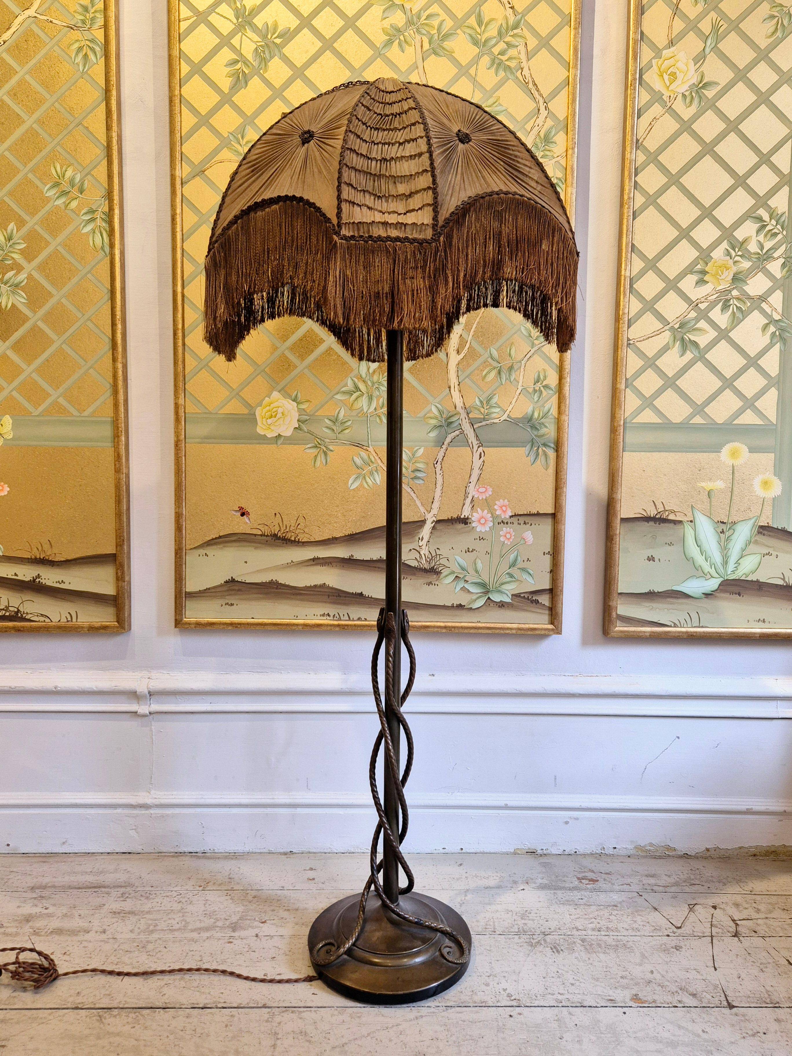 Rare and exquisite bronze floor lamp with intertwined snakes, early 1900s.