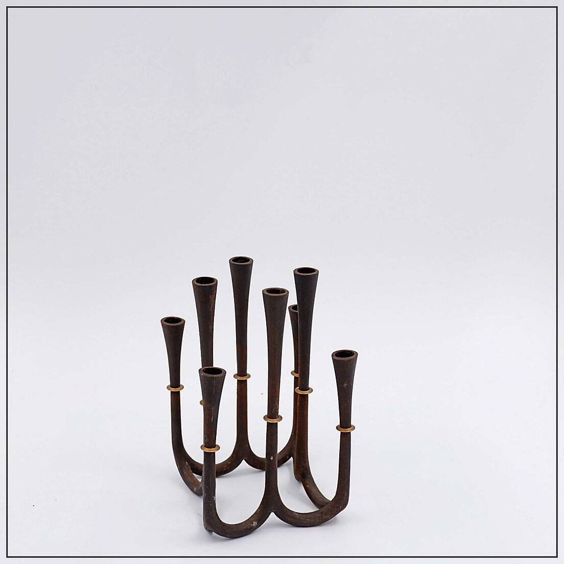 Cast iron and brass candle holder by Jens Quistgaard for Dansk designs, 1960