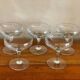 5 champagne glasses with flower decoration
