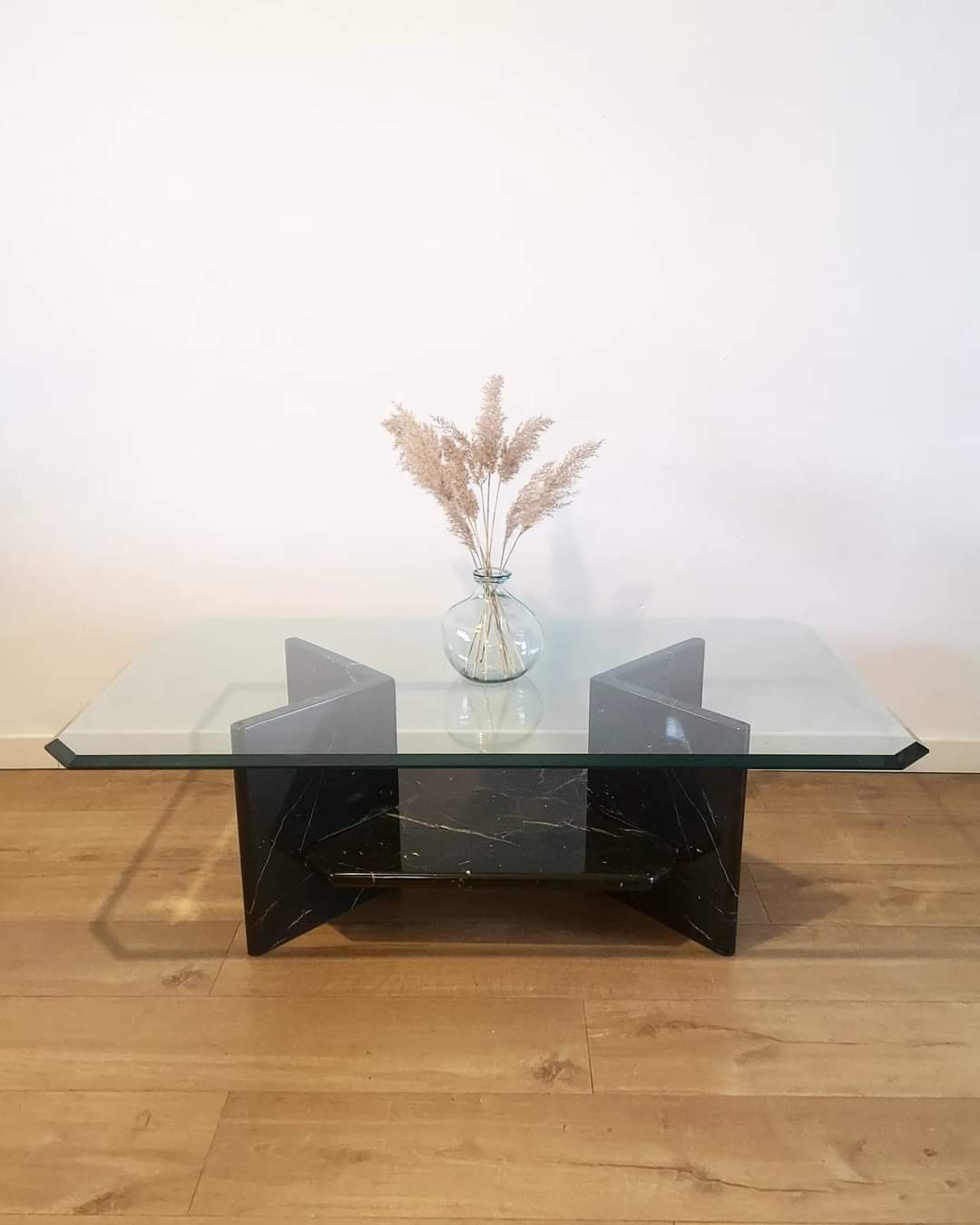 Glass coffee table and black marble base
