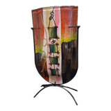 Multicoloured vase in the style of Dali.