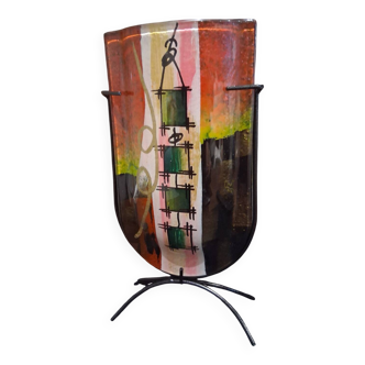 Multicoloured vase in the style of Dali.