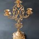 Antique three-light openwork brass church candelabrum.