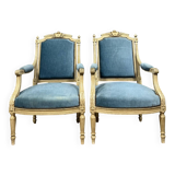 Pair of Louis XVI style armchairs in molded, carved wood