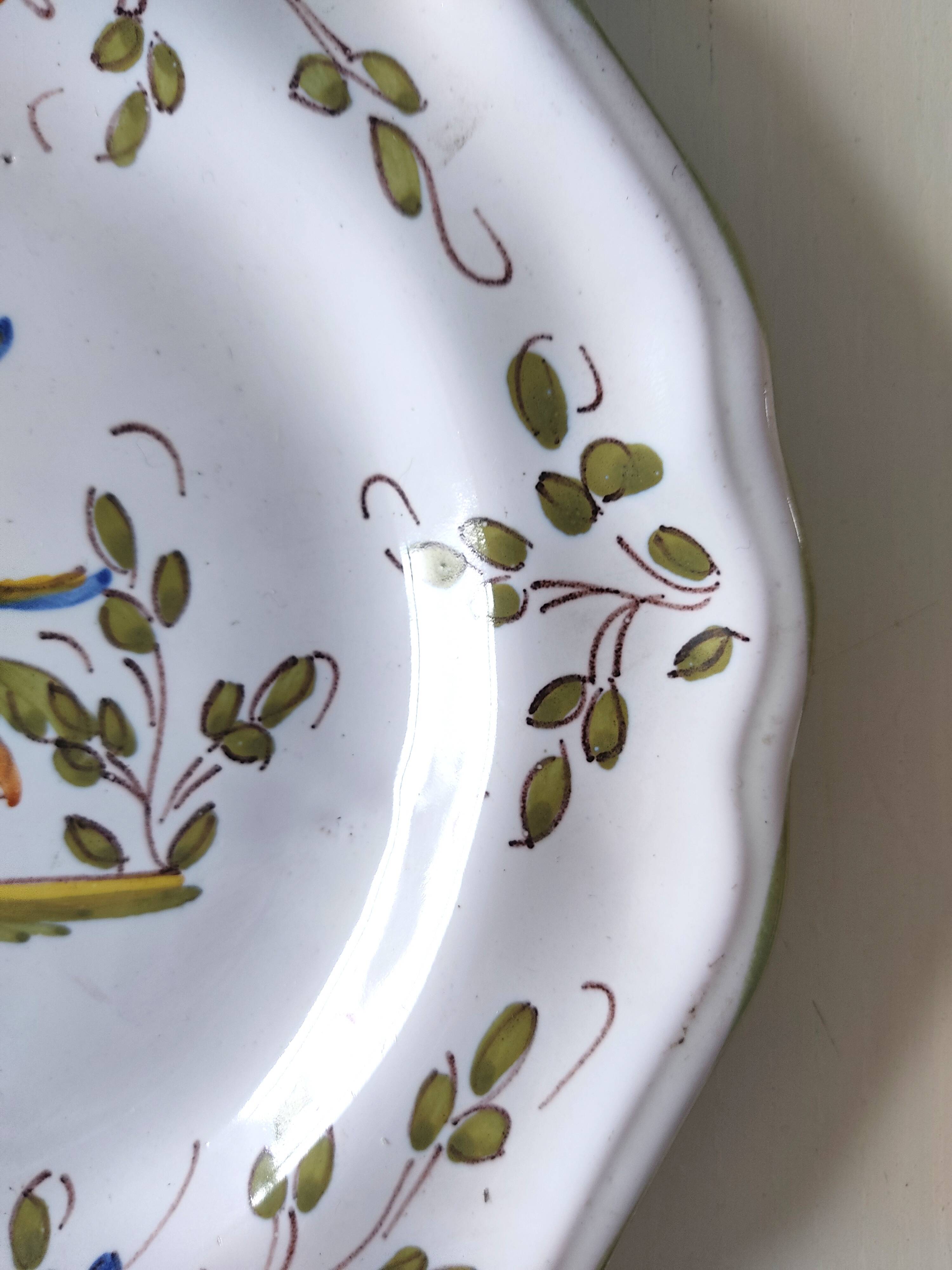 Moustiers earthenware decorative plate with bird