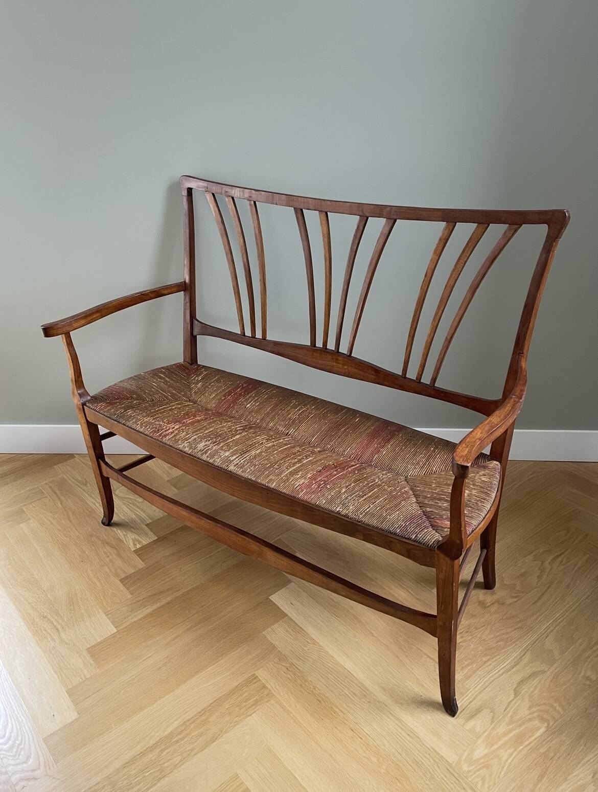 Wooden and straw bench