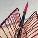 Scoubidou and wrought iron magazine rack