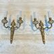 Suite de 4 appliques en bronze de style Louis XVI