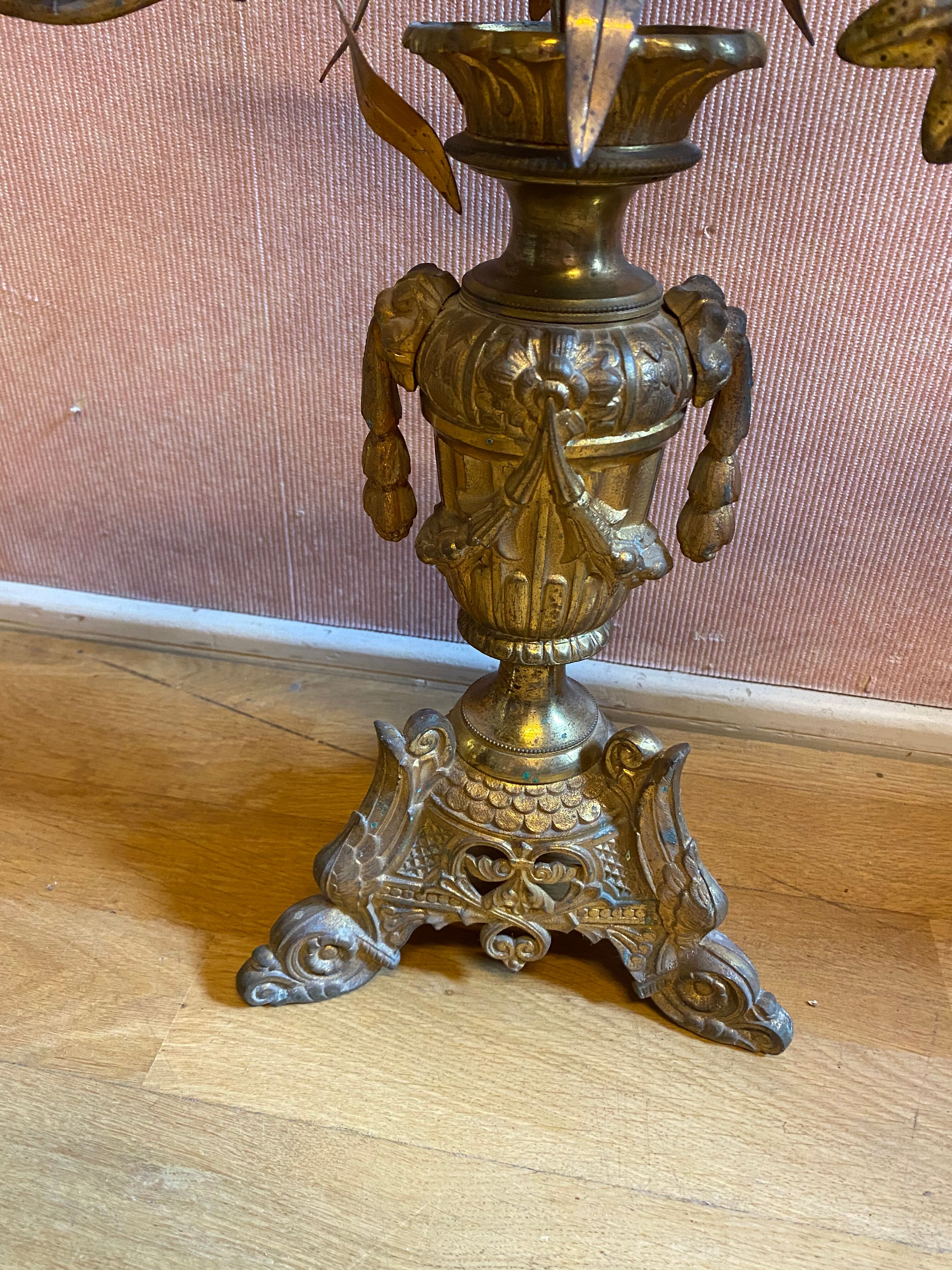 Pair of gilded bronze church candelabras.