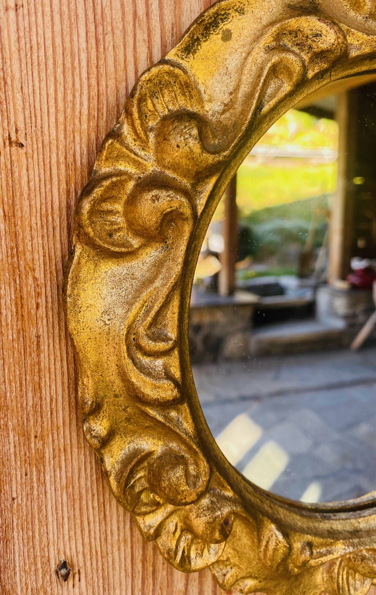 Small round antique gold mirror