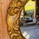 Small round antique gold mirror