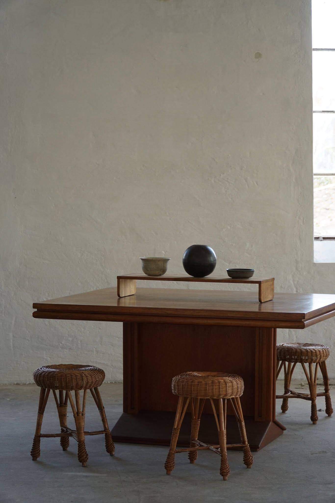 A set of 4 vintage Scandinavian rattan stools, in the style of Tony Paul, from the 1960s.