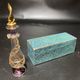 Set of 8 blown glass perfume bottles gilded with 12 carat gold