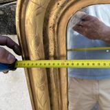 Large Louis-Philippe gilded mirror with gold leaf