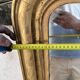 Large Louis-Philippe gilded mirror with gold leaf
