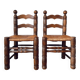 Pair of rustic chairs in the style of Charles Dudouyt.