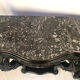 Pair of blackened wooden consoles, marble top