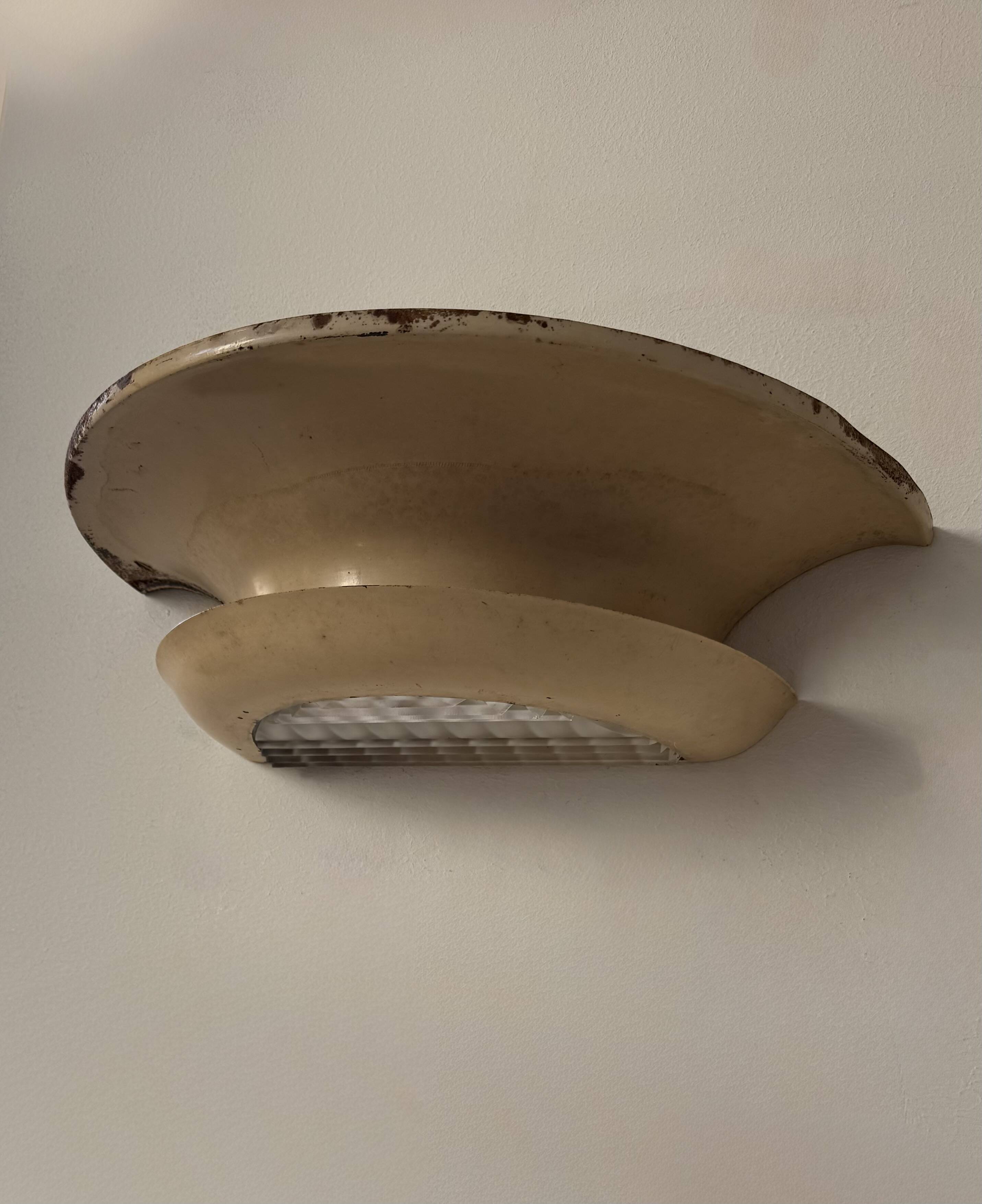 Pair of vintage modernist wall lights, beige painted metal and glass, France, 1930