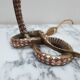 Bronze and silver snake lamp